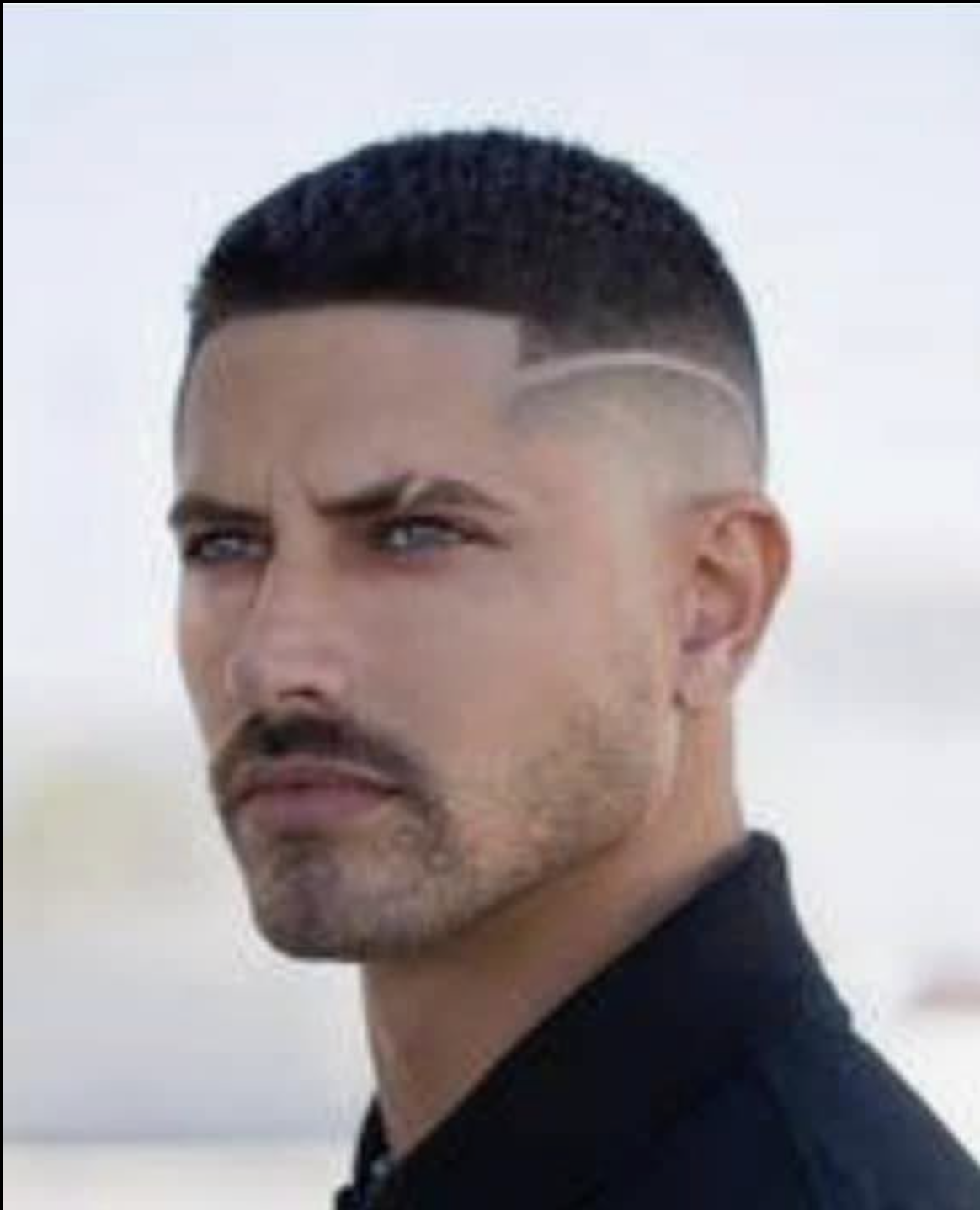 Sharp skin fade with hard part